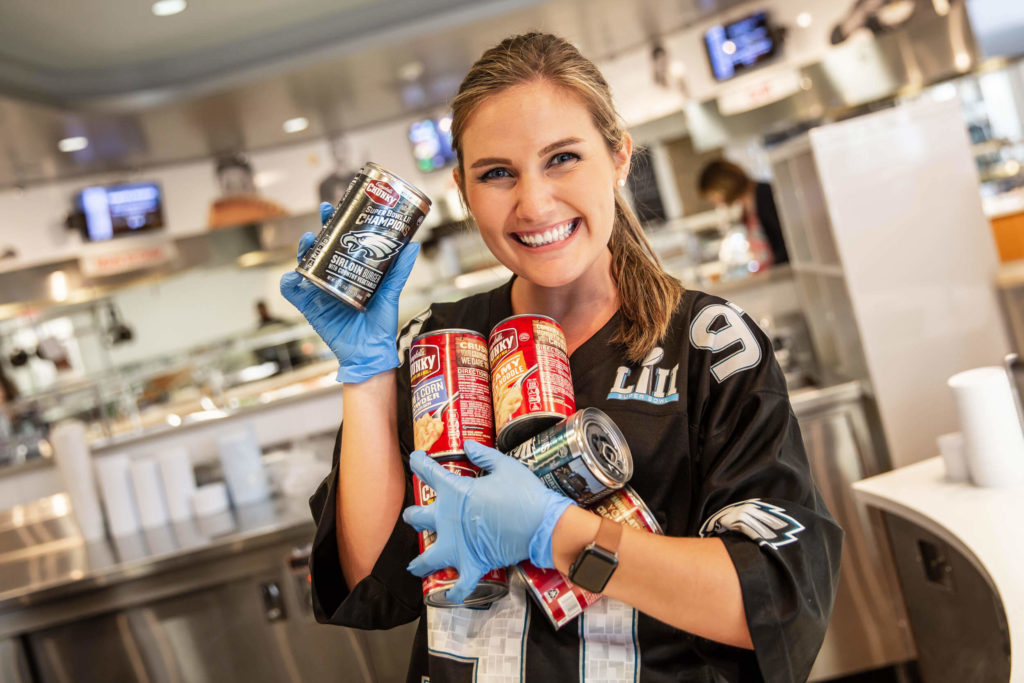 Campbell employee Brittany holding Chunky soup