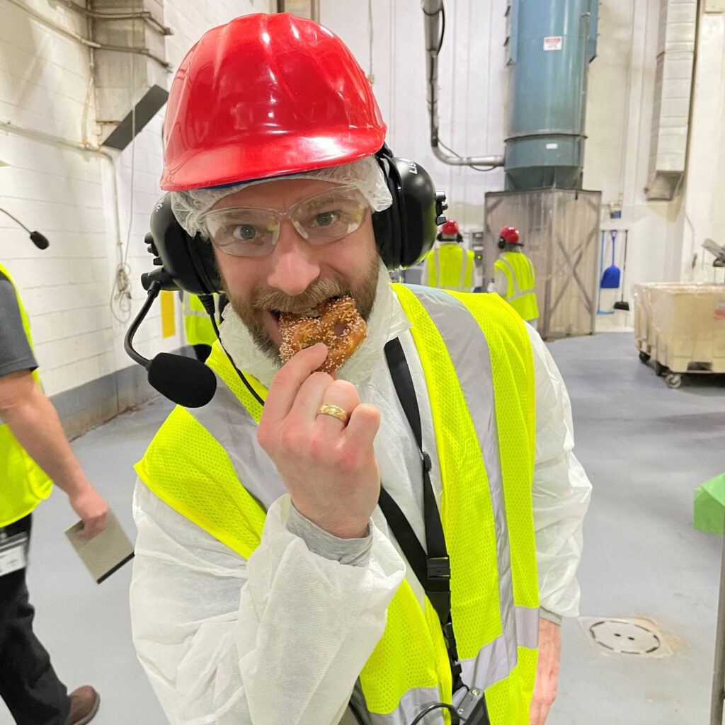 Justin tastes a pretzel right from our Hanover, PA ovens.