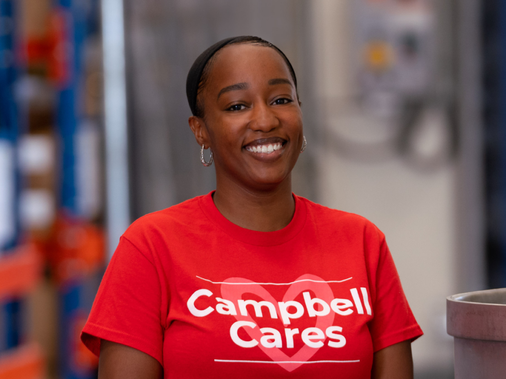 Employee in Campbell's Cares t-shirt