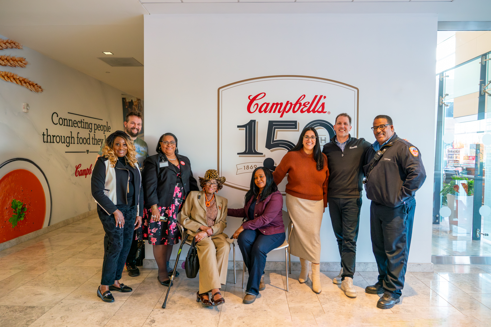 Daisy Lee with her family and Campbell’s employees.
