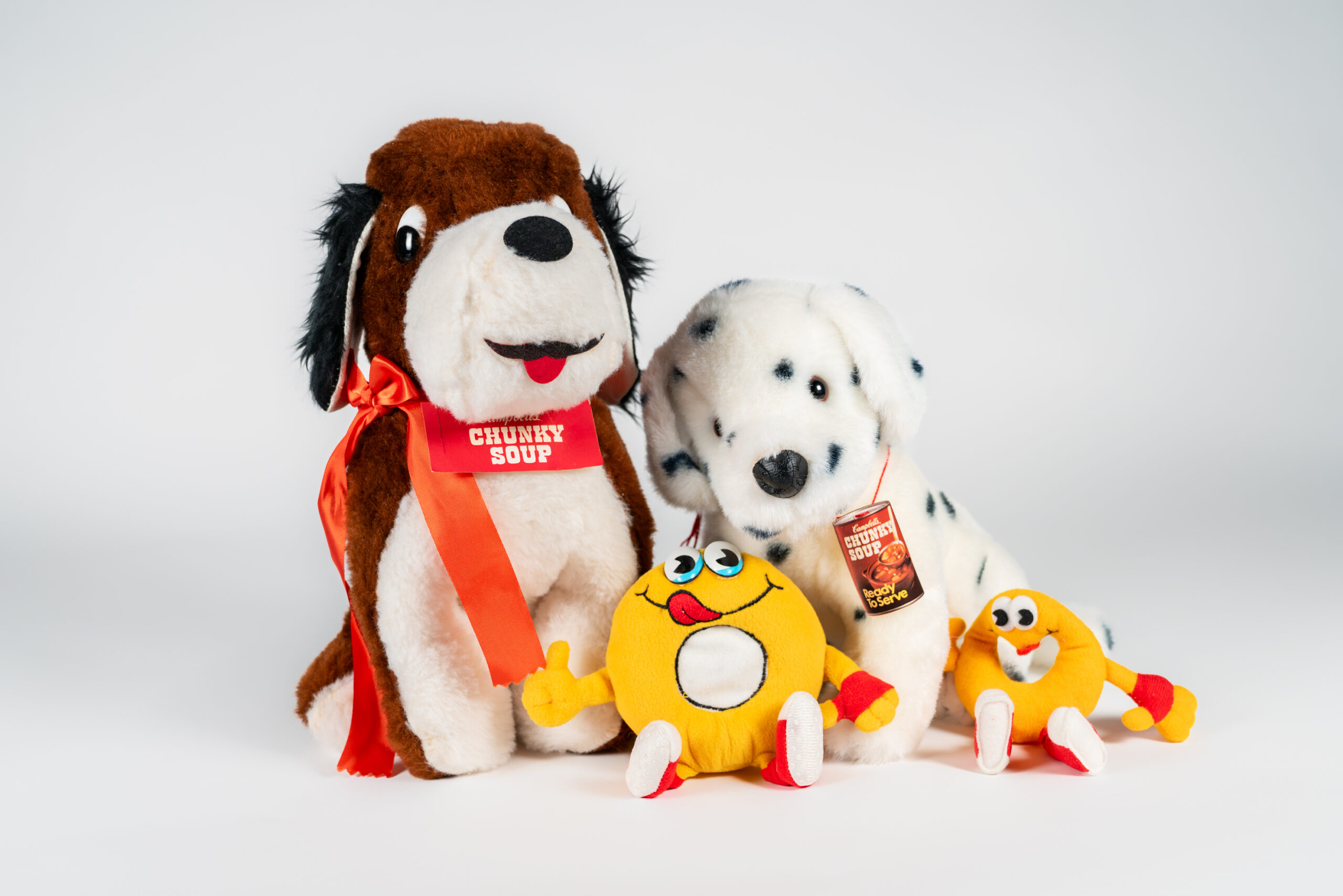 Plush toys of Campbell's Chunky dogs and SpaghettiOs TheO