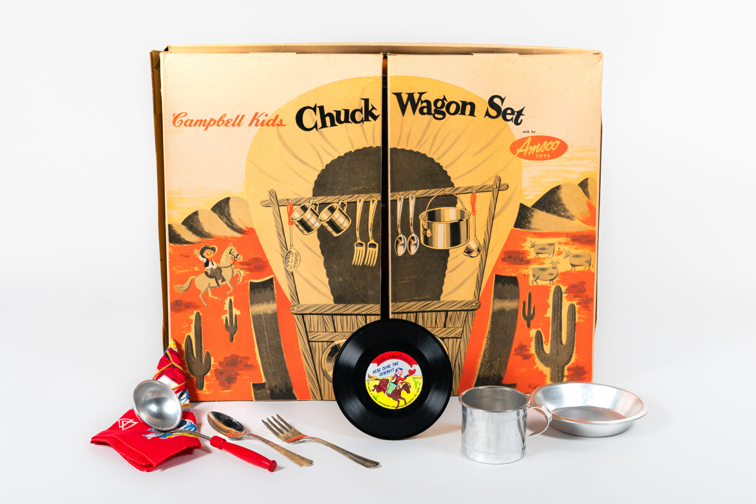 Campbell’s Chuck Wagon Set with cooking utensils, dishes and record.