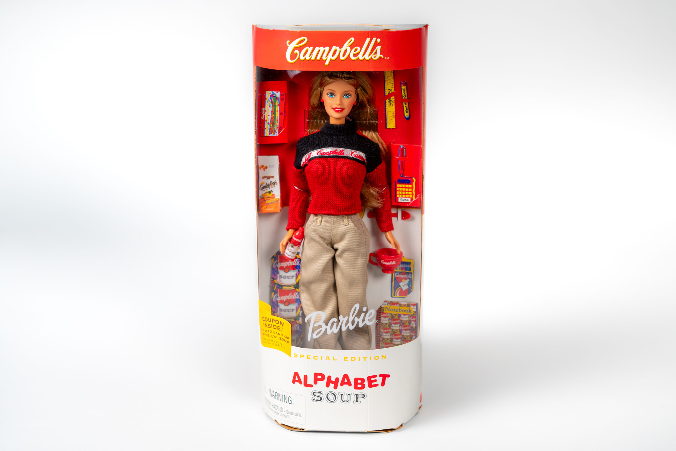 Alphabet Soup Barbie in packaging, featuring Campbell’s and Goldfish.